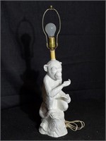 Ceramic table lamp, monkey on tree stump