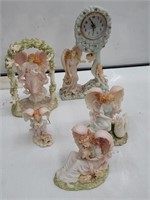 Group of composite angel figurines  box lot