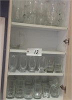 3 shelves of glasses - pitcher