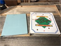 2 binders of football and baseball cards