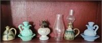 Lot with oil lamps.