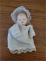 Small antique doll.
