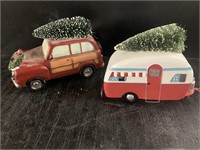 PLASTER CAR AND METAL TRAILER CARRYING TREES