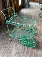 Antique green metal garden cart