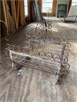 Antique metal swirl design firewood rack