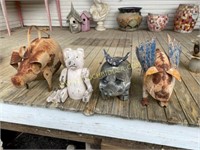Assorted outdoor pig art pieces