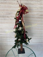 3 ft tree with santa boot ornaments