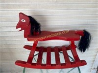 Nice red wooden rocking horse