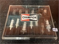 CHAMPION SPARK PLUGS IN DISPLAY CASE