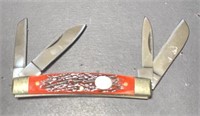 Legend 4 bladed knife with red bone handle