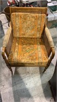 Hibritten cane arm chair with orange paisley