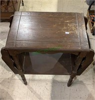 Vintage side table with magazine holders on each