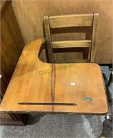 Small child size school desk with a writing