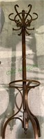 6 foot coat rack with a spinning top that has
