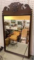 Large wall mirror with a fancy scroll open work