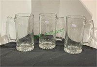 Set of three glass beer mugs, 7 inches tall.(793)