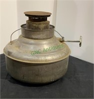 Antique kerosene heater. Measures 8 1/2 inches