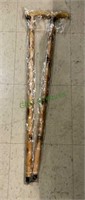 Two wooden canes with different carving. Measures