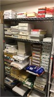 Large collection of Printer Paper on shelf unit