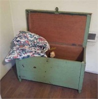 Wooden Chest, Dolls, and Comforter