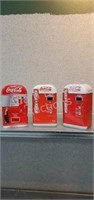 3 Coca-Cola collector soda machine tins