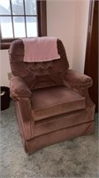 Clean pink swivel arm chair
