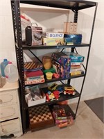 Metal shelf full of games and toys