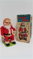 VINTAGE BATTERY OPERATED HAPPY SANTA TOY