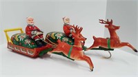 2 VINTAGE BATTERY OPERATED SANTA WITH SLEIGH TOYS