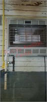 Empire natural gas radiant heater. On wall. Buyer