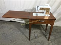 Singer Auto-Reel Sewing Machine.