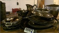 Silver serving plates, pitcher, and more
