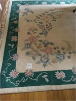 Area rug approximately 8’ x 11’