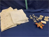 2 tablecloths, napkin rings, leaf candleholder,