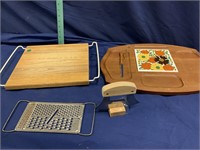 Wooden serving trays, grater, chopping knife