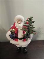 Santa Figures Holding Tree