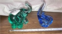 Green and blue glass elephants