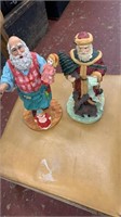 2 Santa Claus figures