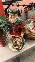 Santa statue and Christmas basket