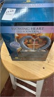 Flowing heart led fountain