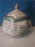 Lidded decorative container with lid in the A