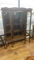 6 legged bow front china cabinet with key