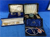 Assorted costume jewellery in cases