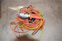 4 extension cords and trouble light
