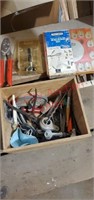 Box of assorted tools and craftsman molding set.