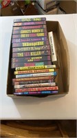 Adult VHS videos and DVDs as shown.