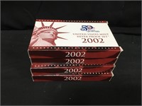 Four 2002 US Mint Silver Proof Sets