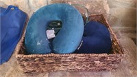 Basket with 2 neck pillows and other misc items