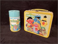 Vintage Sesame Street lunch box and thermos