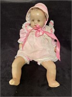Antique baby doll with bisque eyes